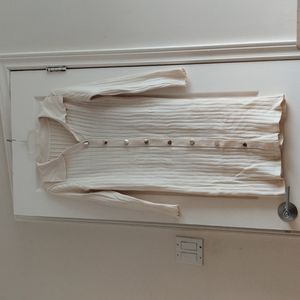 Long cream sweater dress cardigan with gold buttons